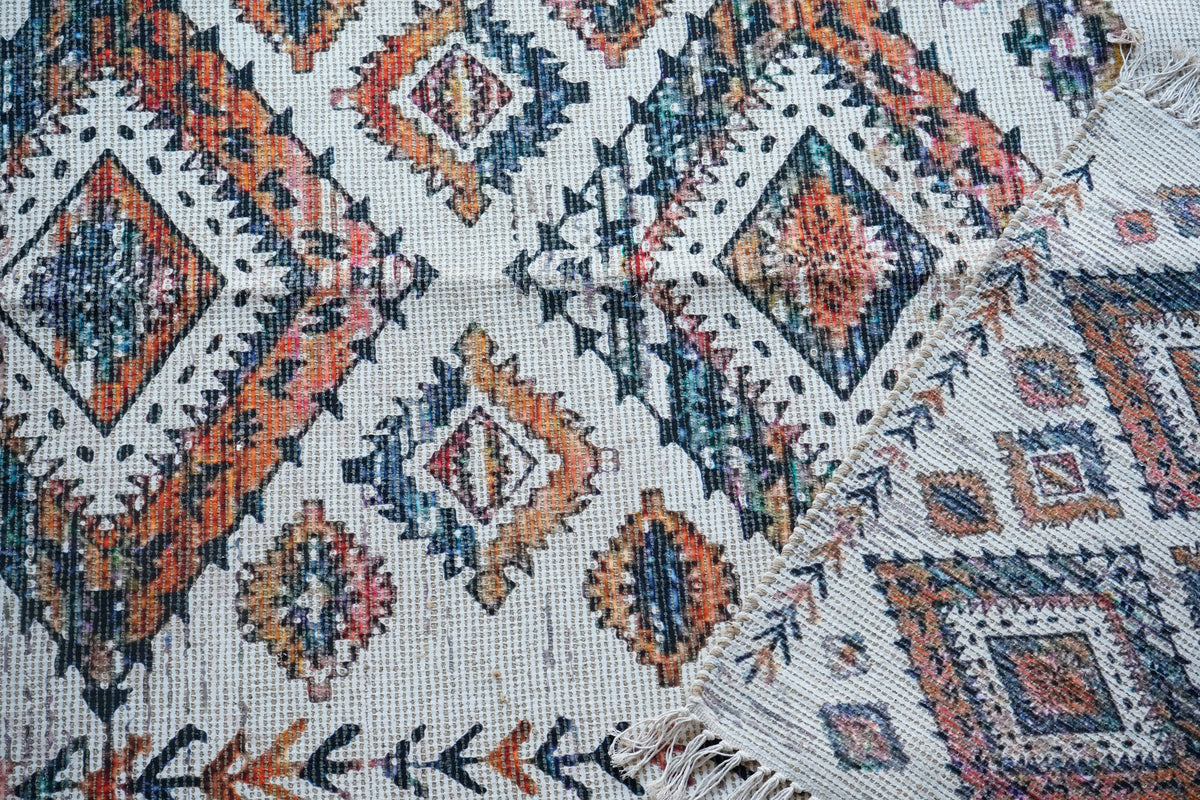Off white jute rug styled in a living room