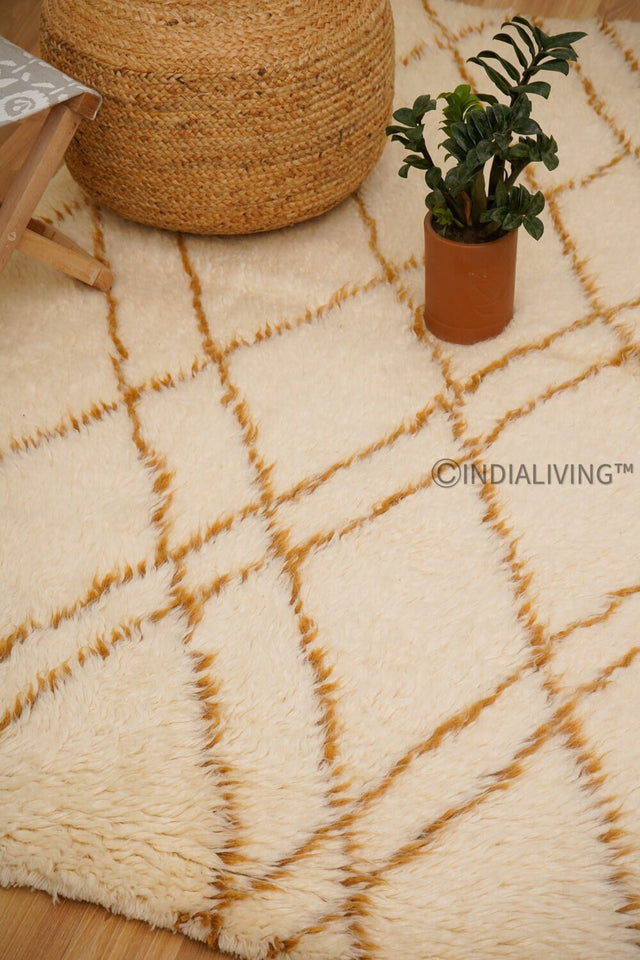 Ivory abstract Moroccan wool rug flat lay