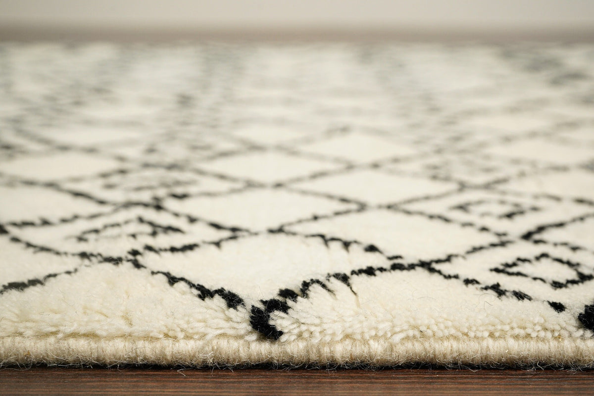 Ivory wool rug texture close-up showing plush pile