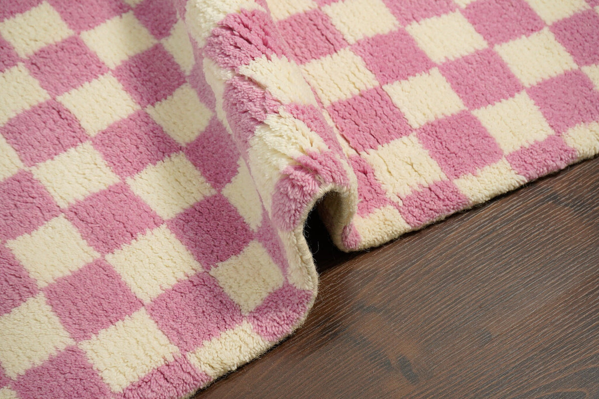 Wool rug styled in bedroom