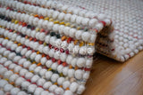 Full-size view of colorful chunky rug