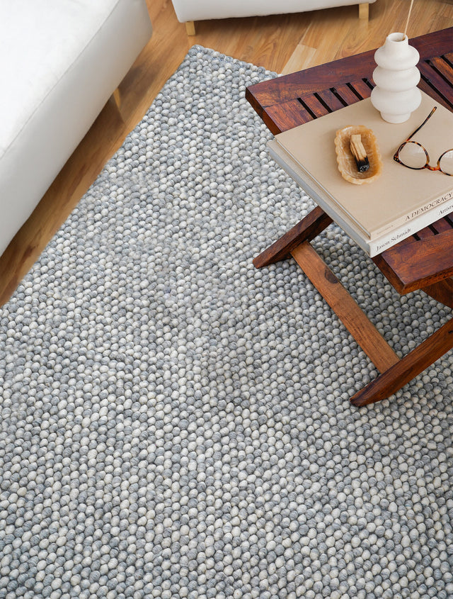 Grey chunky looped wool rug flat view