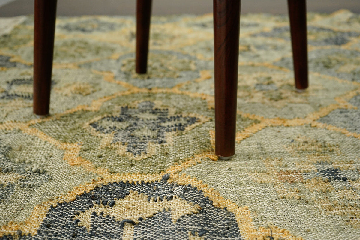 Sage green jute rug corner detail