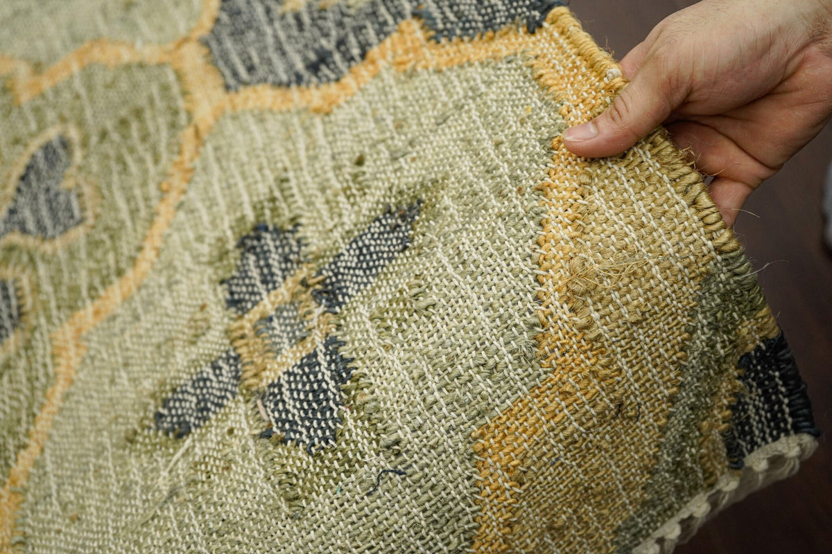Sage green jute rug reverse side detail