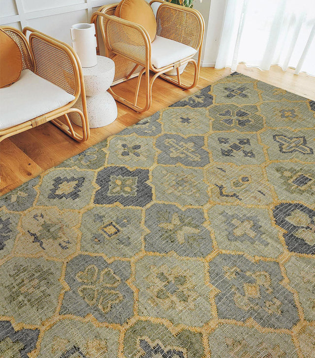 Sage green jute rug styled in a modern living room