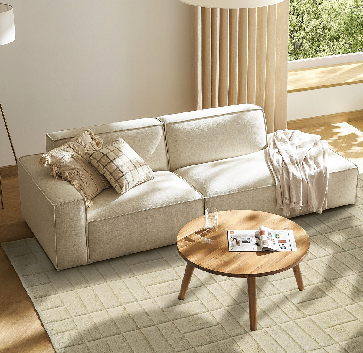 Wide shot of ivory geometric rug in a Scandinavian-style room