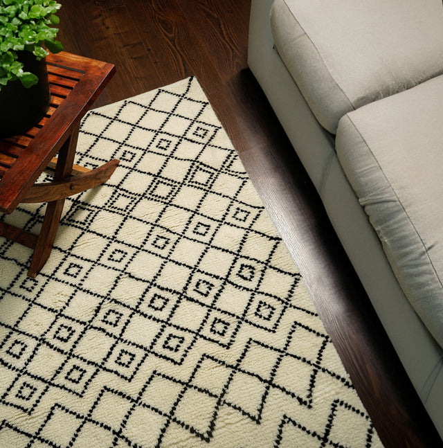Ivory Berber rug styled in a contemporary living room