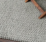 Close-up of cashew weave loop texture on wool rug