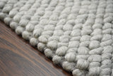 Grey wool rug corner detail