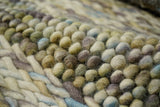 Multi colour wool rug under natural light