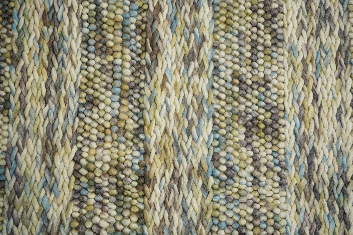 Multi colour wool rug shown as round variant