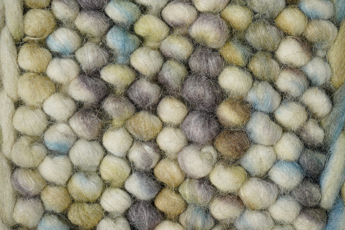Close-up of colourful wool loop pile texture