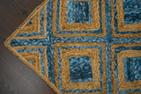 Blue braided jute rug weave close-up