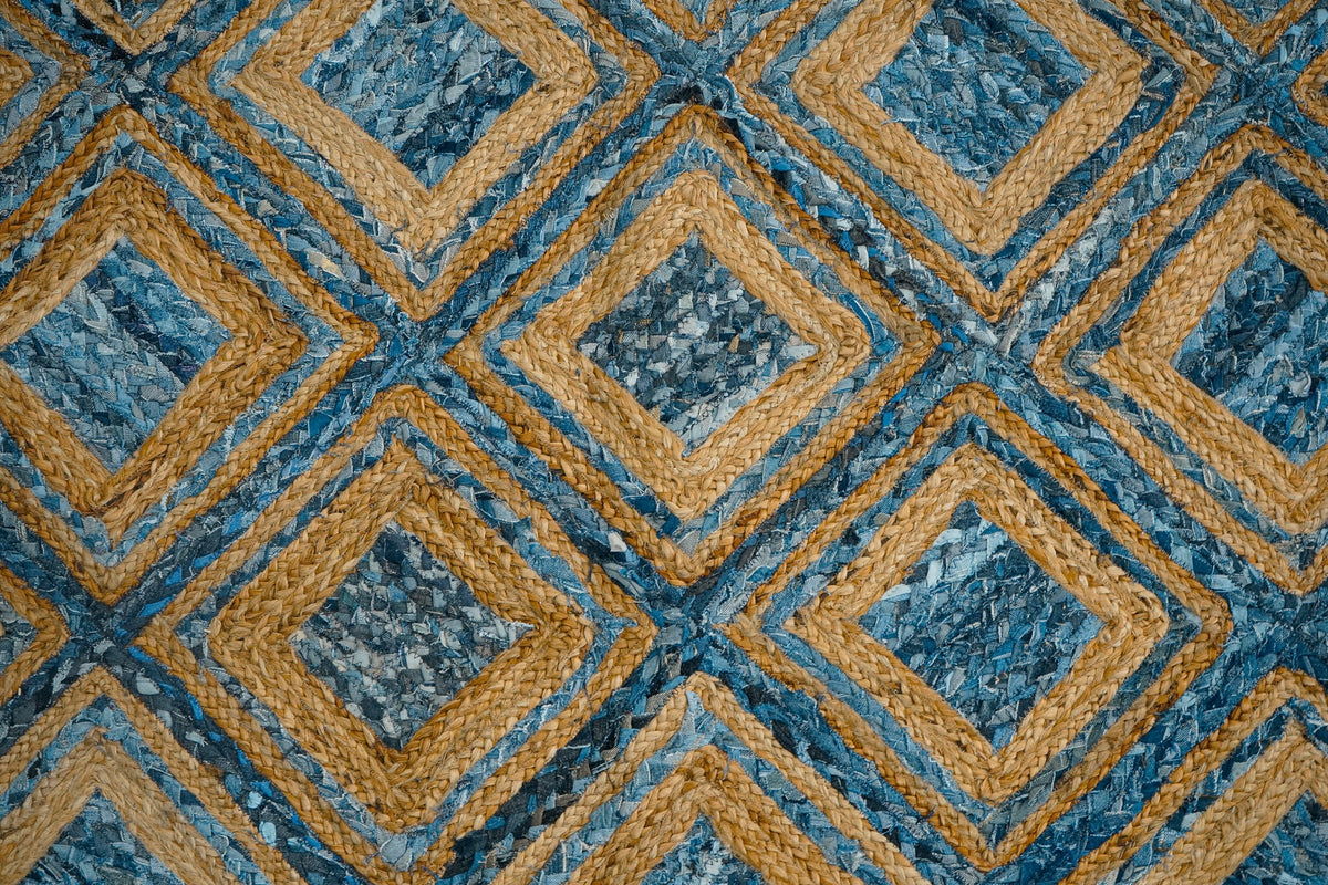 Blue braided jute rug texture close-up