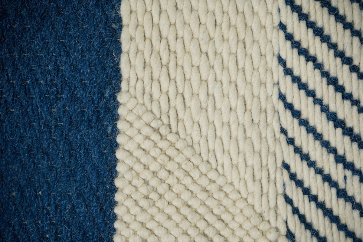 Bohemian blue wool rug styled in living room