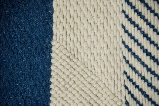Bohemian blue wool rug styled in living room