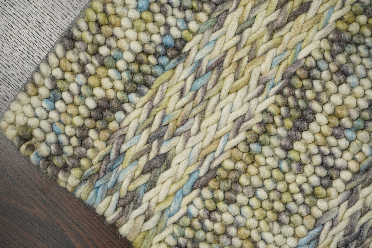 Multi colour wool rug corner detail