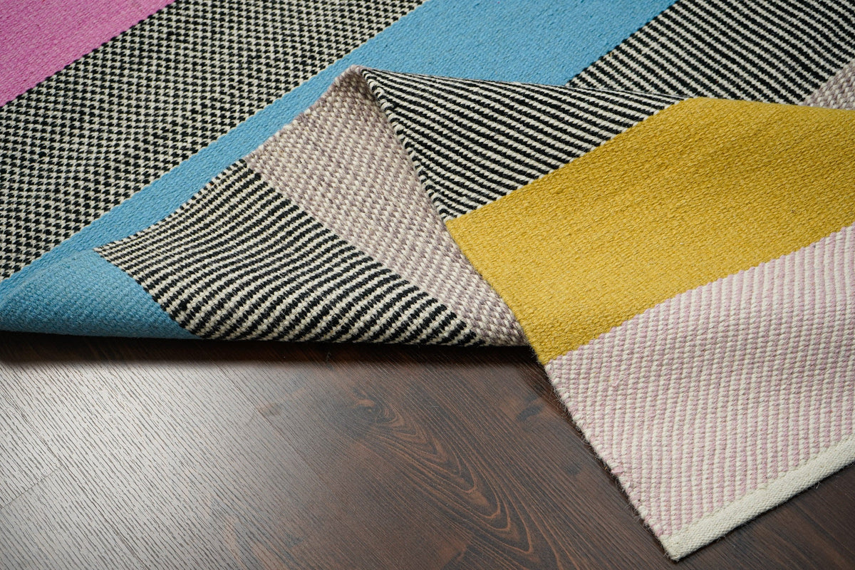 Rainbow kilim rug styled in modern living room