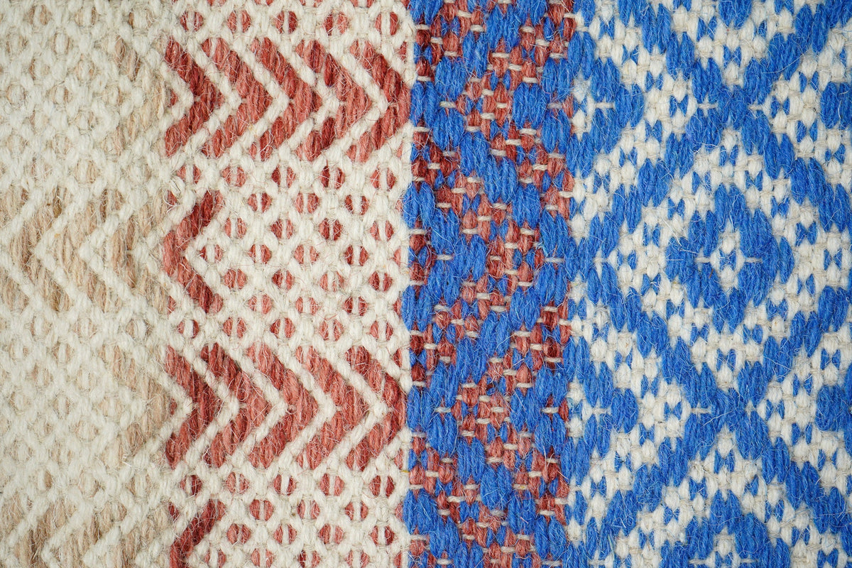 Full view of flatweave rug on floor