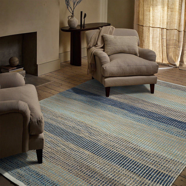 Blue striped modern wool rug flat lay