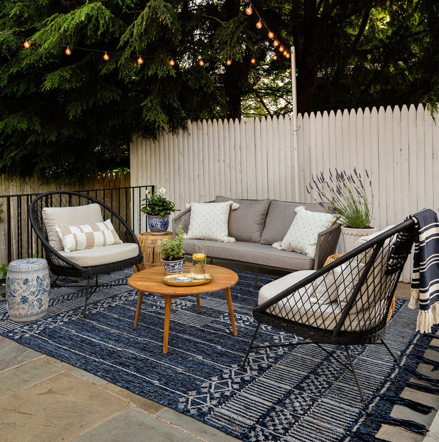 Dark denim blue wool kilim rug, flat lay view