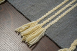Gray tasseled wool rug alternate angle