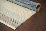 Blue striped rug styled in hallway
