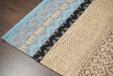 Full view of striped bohemian wool rug on floor