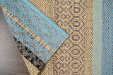 Bohemian striped rug corner detail showing weave