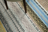 Multi striped wool rug full flat lay top view