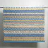 Blue and yellow kilim rug corner detail