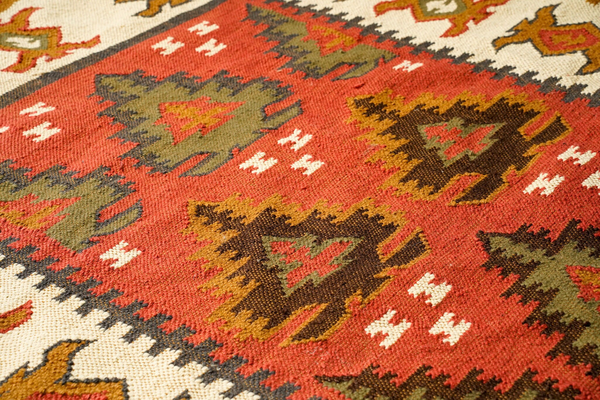Southwestern red kilim rug reverse side showing reversible design