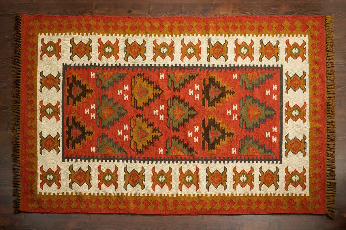 Southwestern red kilim rug folded for shipping