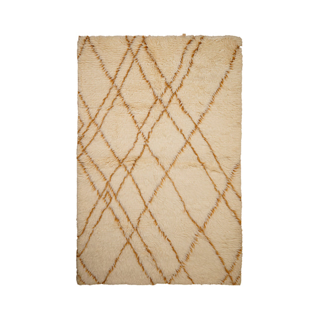 Ivory rug styled in living room