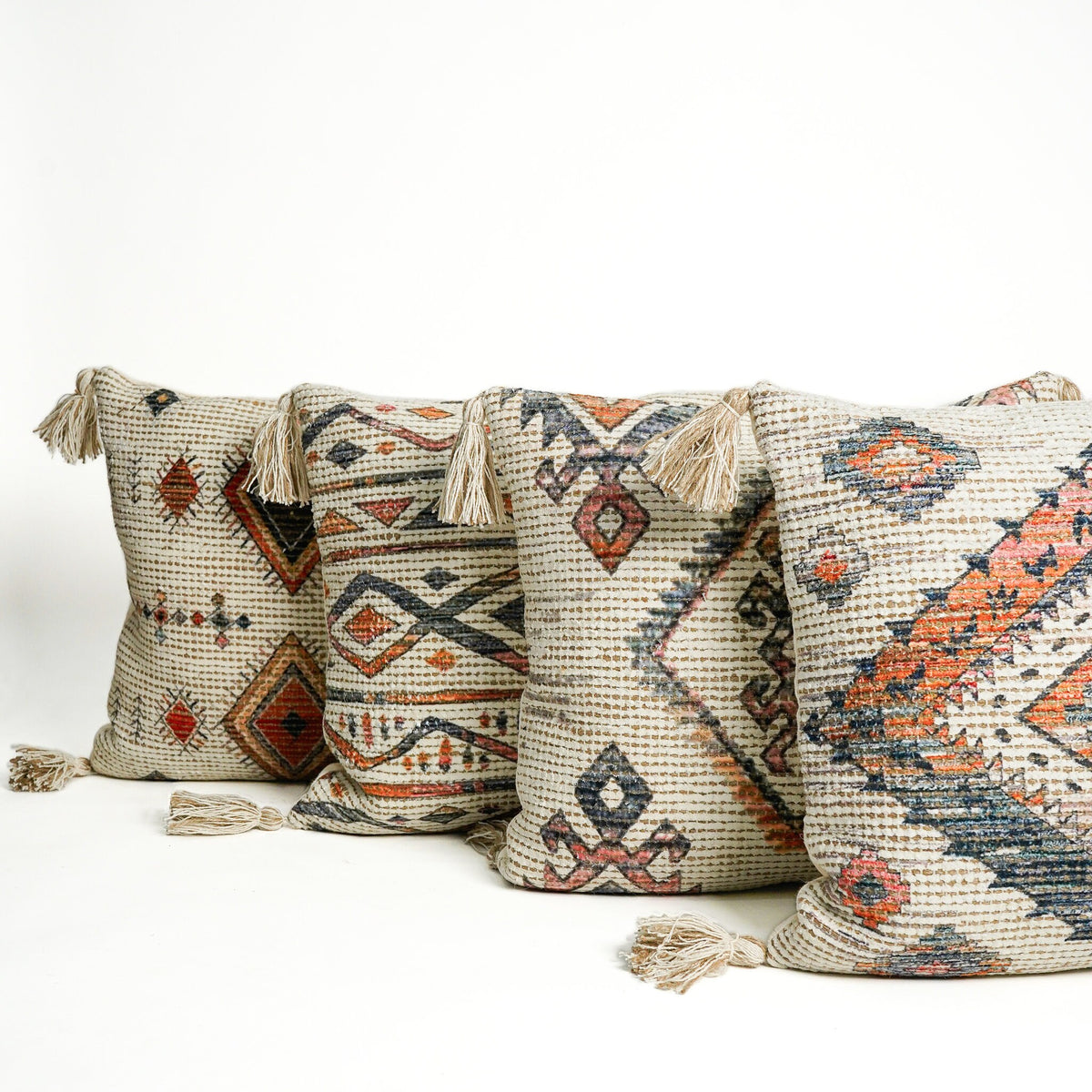 Ivory cushion covers styled on a living room sofa