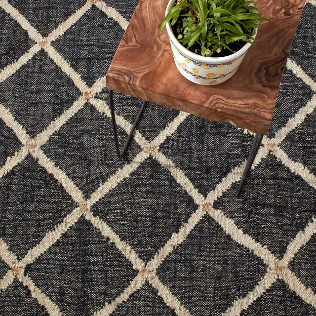 Black geometric jute rug, full flat view