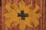 Kilim rug styled beside furniture