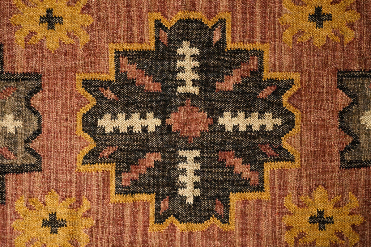 Southwestern rug in a bedroom setting