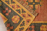 Orange kilim rug in southwestern styled room