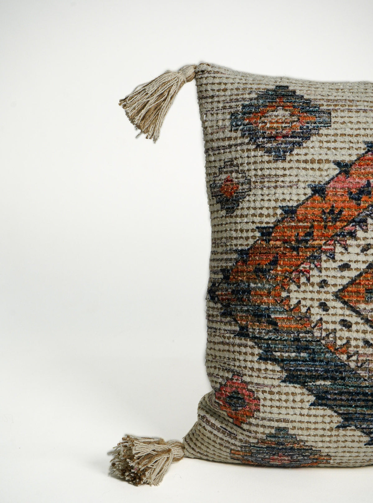 Ivory cushion cover shown at an angle highlighting texture