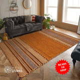 Brown kilim rug styled in a living room