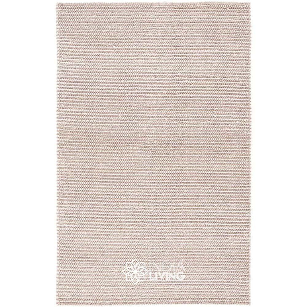 Ivory and light brown wool rug texture close-up