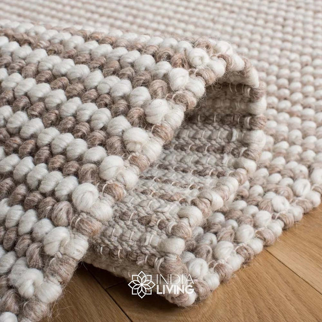 Chunky looped wool rug flat lay showing texture