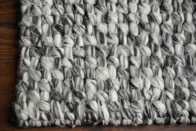 Grey mixture loop chunky wool rug, flat lay view