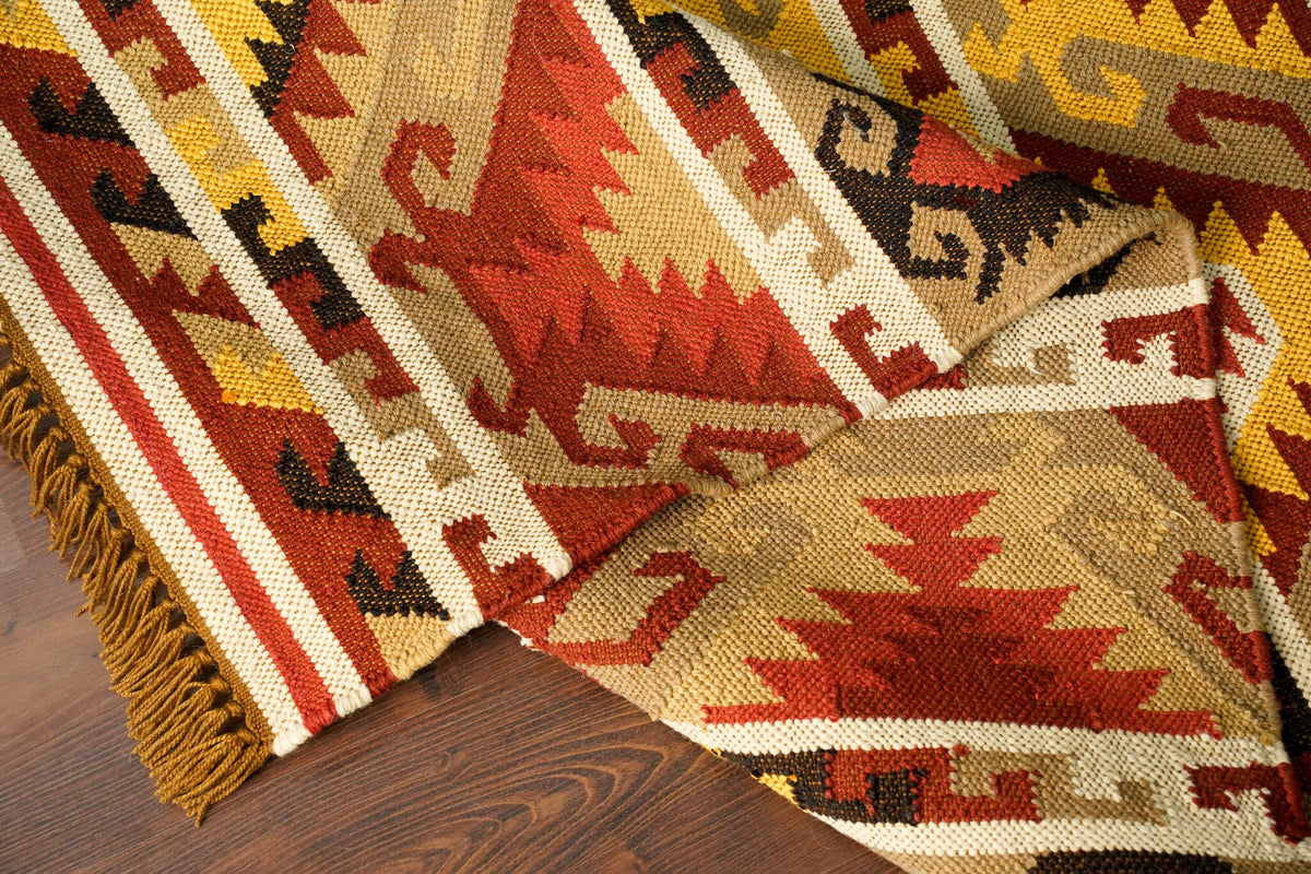 Tribal pattern detail on wool jute kilim rug