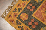 Full flat lay of orange Navajo kilim rug