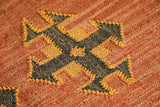 Orange wool jute rug reverse side detail
