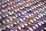 Purple wool rug corner detail showing weave