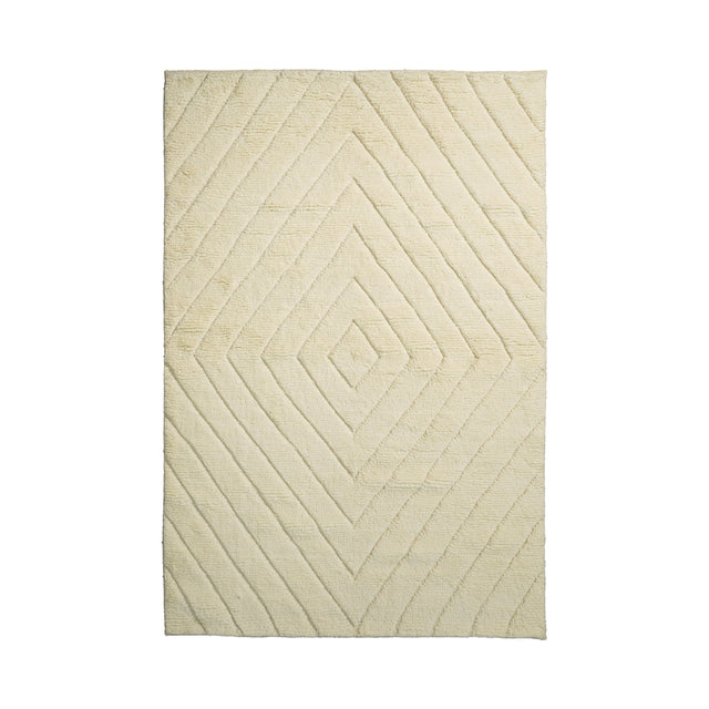 Ivory abstract geometric wool rug, flat lay view