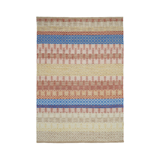 Beige striped rug styled in Scandinavian living room